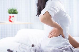 6 Simple Sciatica Stretches You Can Do In Bed